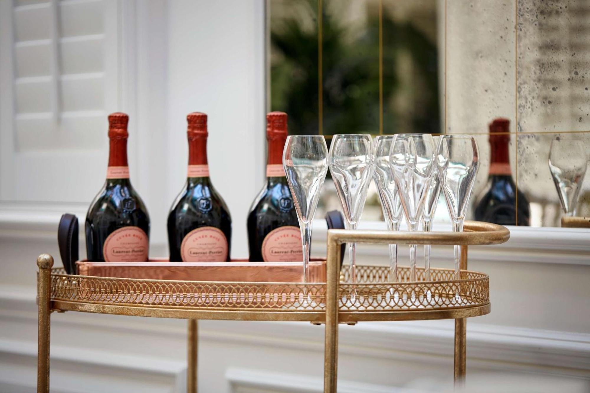 100 Queen'S Gate Hotel London, Curio Collection By Hilton Facilities photo Champagne bottles on a bar cart